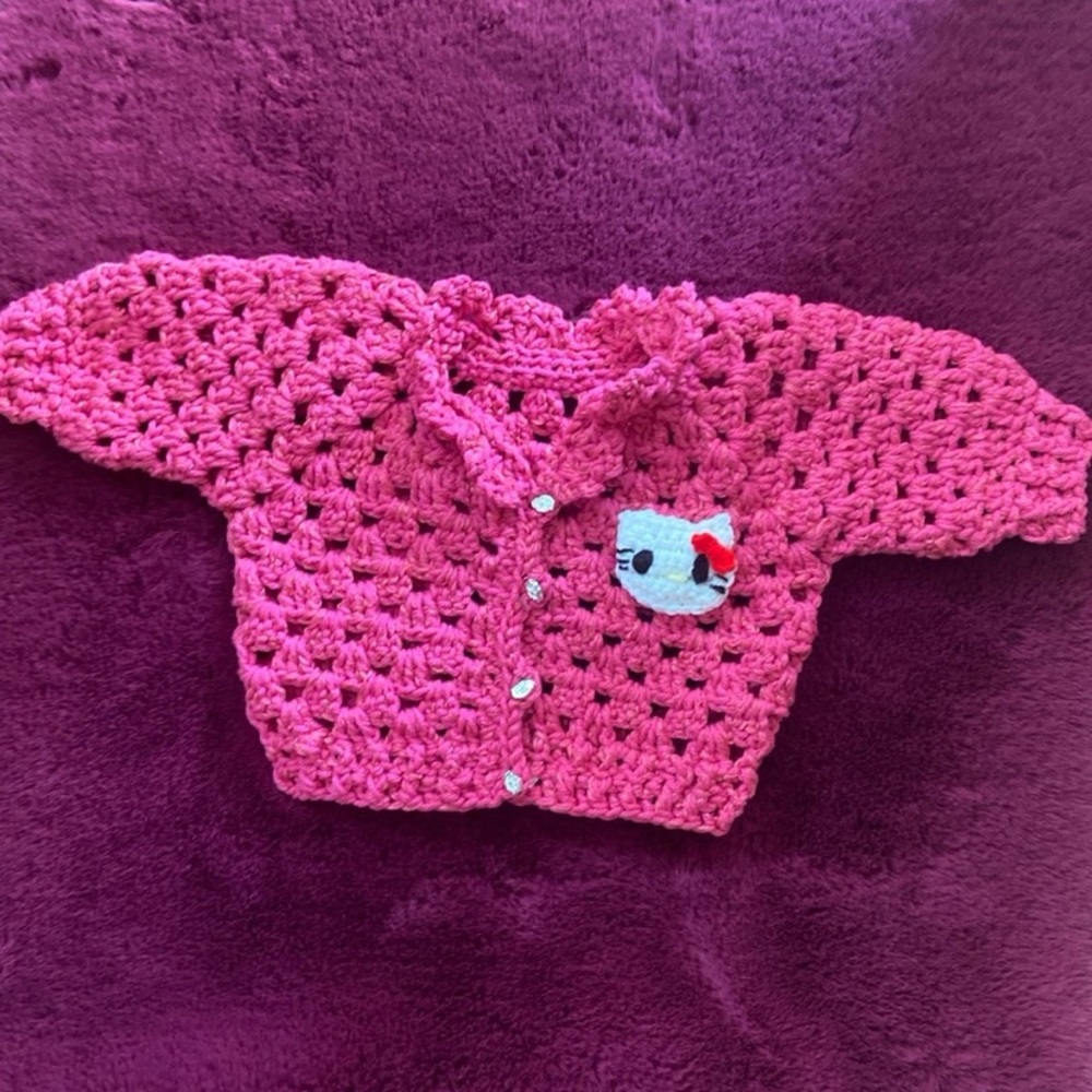 Crochet newborn baby cardigan 
Hello kitty 
Yarn 50%acrylic 50%cotton